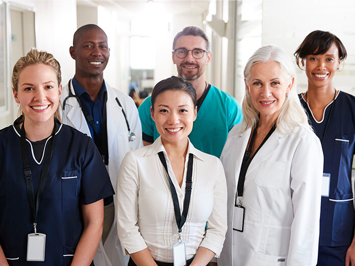 A team of smiling healthcare professionals